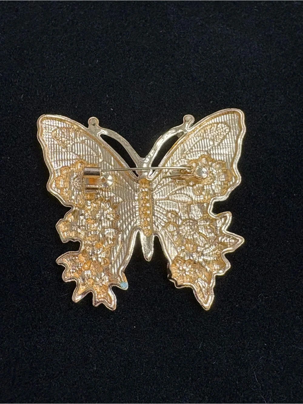 Enamel butterfly brooch. Gold tone.